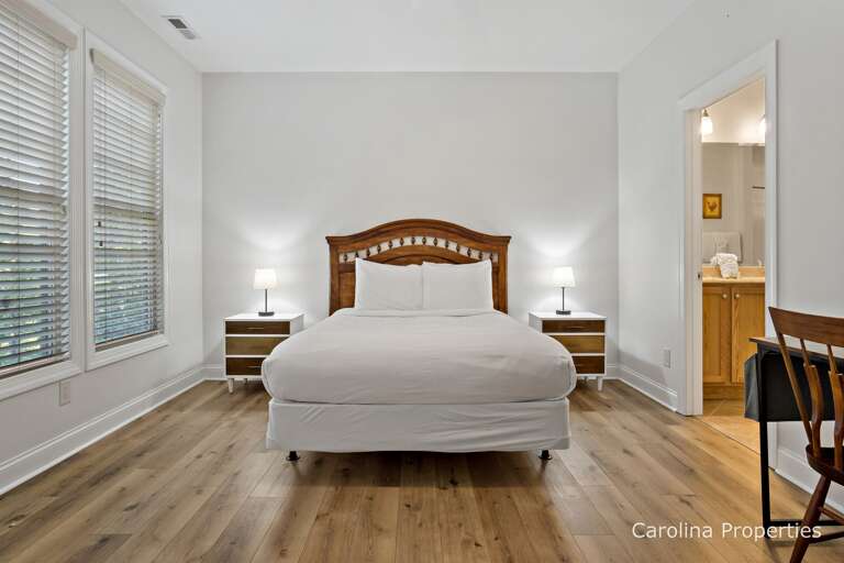 Lower level private bedroom with queen bed