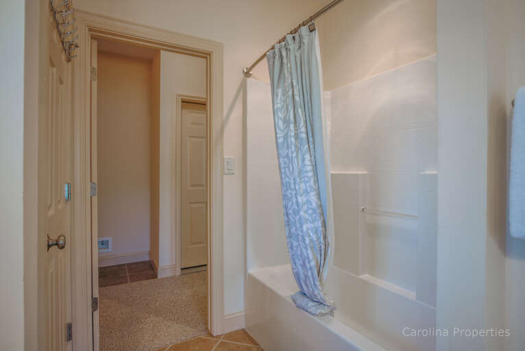 Lower level full bathroom accessible from private sleeping room and hall