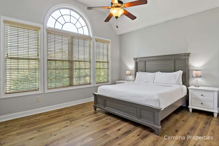 Main level master bedroom with king size bed