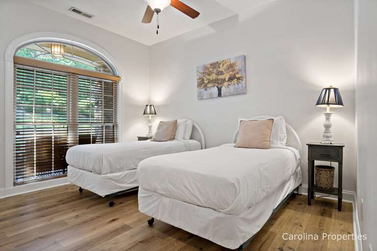 Main level bedroom 3 with two twin size beds