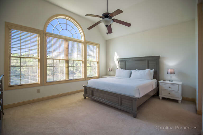 Main level master bedroom with king size bed Main level master bedroom with king size bed