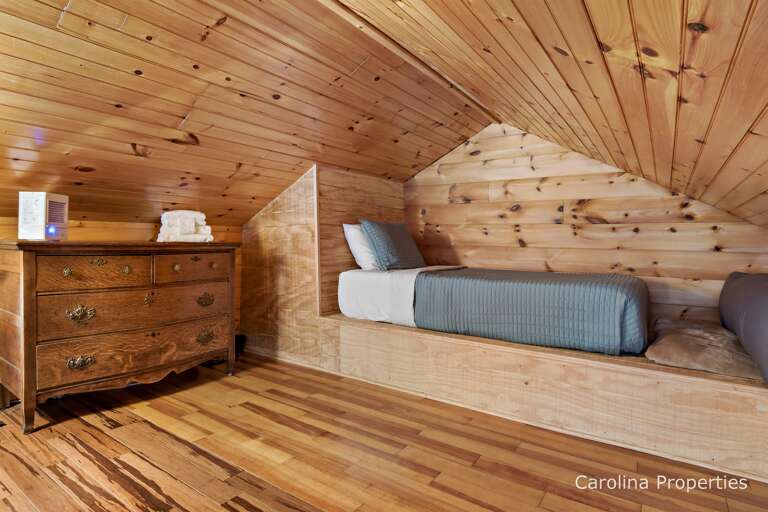 Twin size sleeping area in the loft