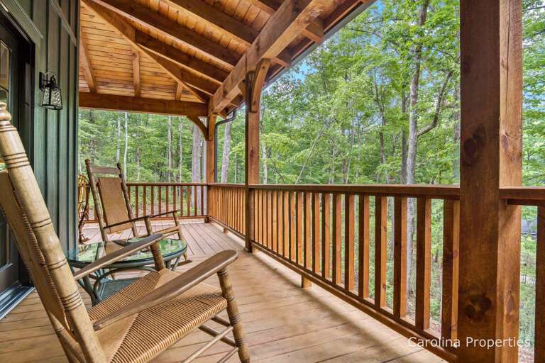 Covered deck with attractive decor and furniture