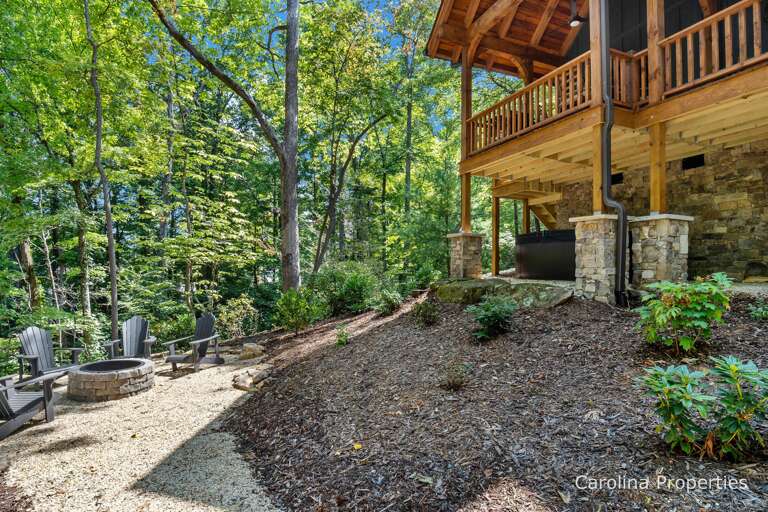 Hot tub located below the deck