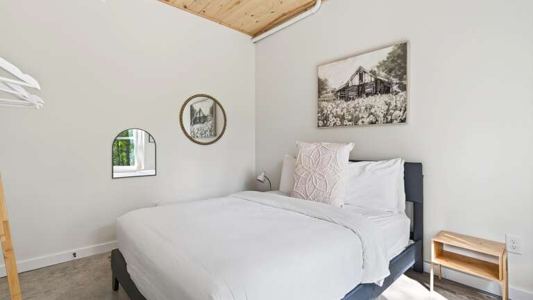 Queen bed on the lower level