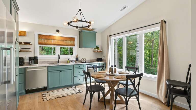 Large windows in the kitchen let in natural light