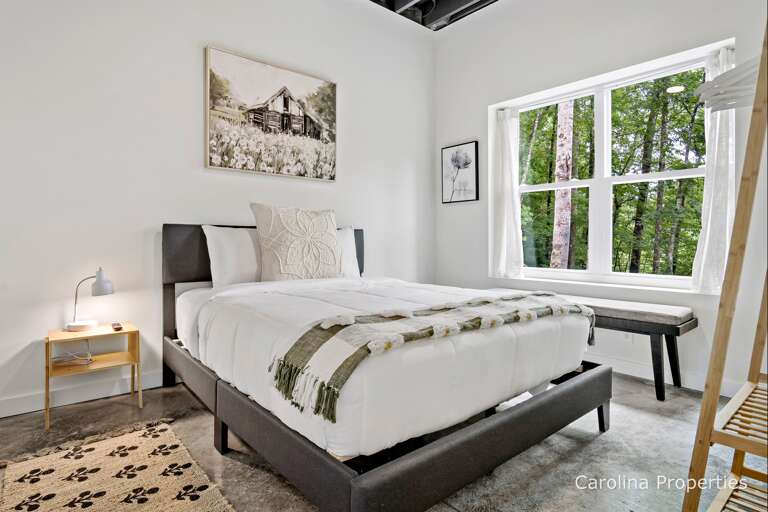 Queen bed on the lower level