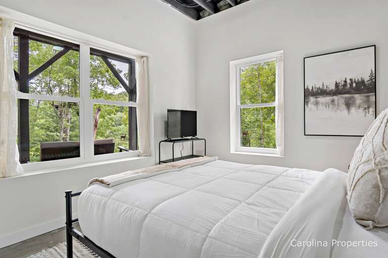 Bedroom 2 is located on the lower level