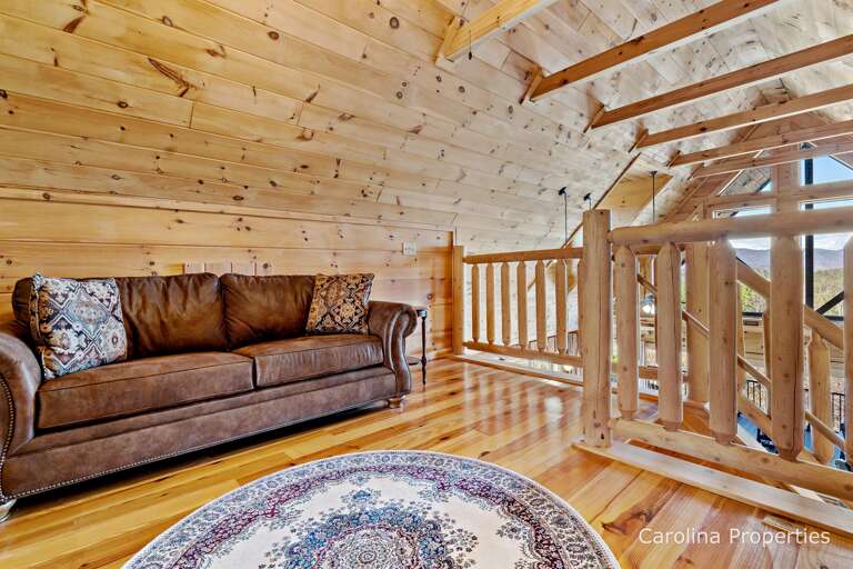 Couch in the loft has a Queen size pull out bed for extra places to sleep