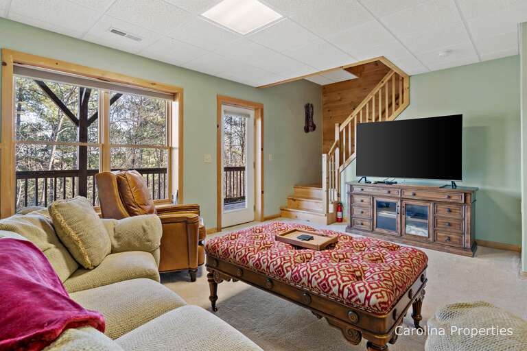 Head downstairs to a second living area in the Basement