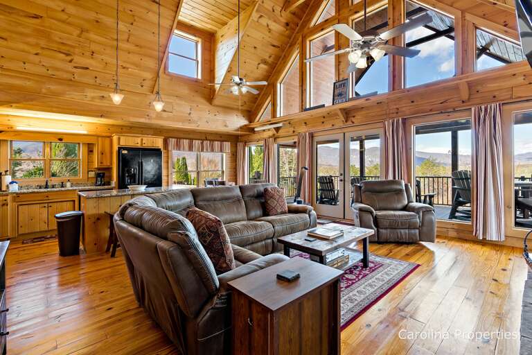 Large windows allow for plenty of natural light, and a beautiful view of the mountains