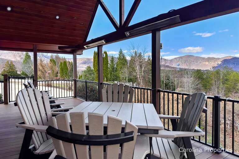 Enjoy outdoor relaxation on the deck with plenty of seating and beautiful views