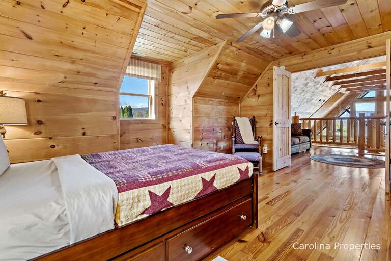 Upstairs bedroom with access to the open loft