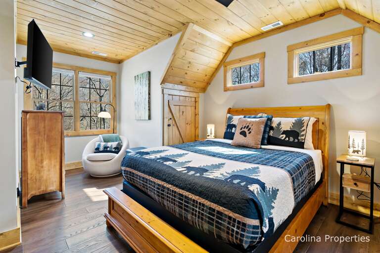 Large upstairs bedroom with queen sized bed