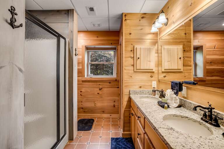 lower level full bathroom with walk in shower