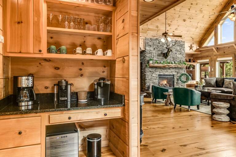 Main level kitchen features a coffee bar