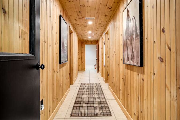 Head to lower level where you will find 3 more bedrooms and 2 bathrooms