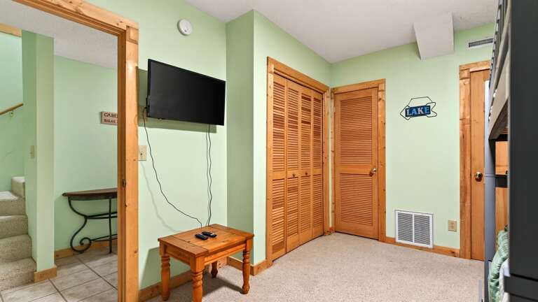 The bunk room has a TV