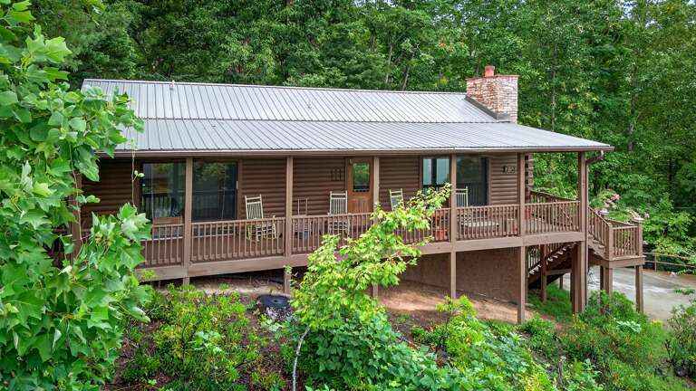 This home features a large, wrap around deck
