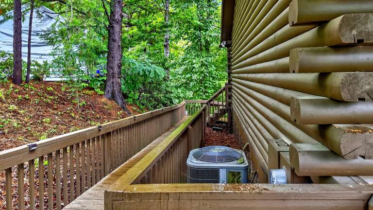 Walkway to the back deck from the front of the house