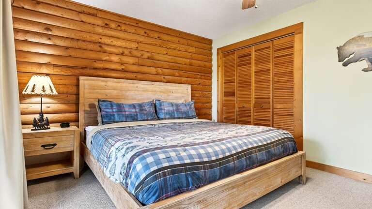 Main level bedroom with king bed