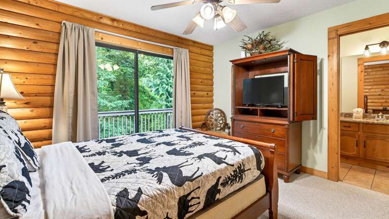 The queen bedroom has a TV