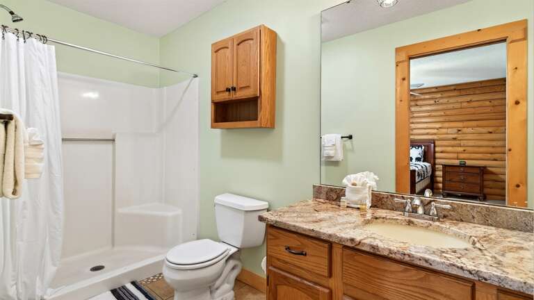 Full bathroom on  main level with walk in shower