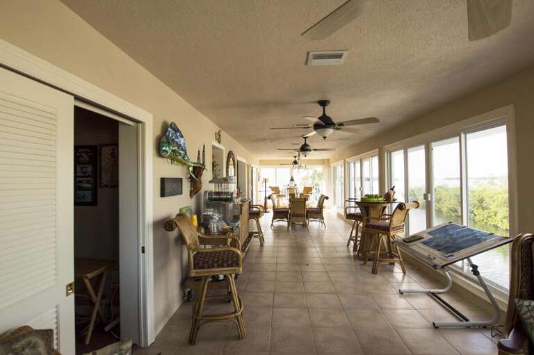Interior With Dining Tables And Ceiling Fans