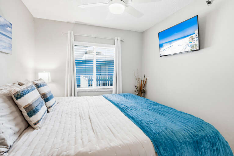 Drift off to sleep in your coastal-themed bedroom, where crisp linens and ocean-blue accents create a peaceful retreat after your beachside adventures.