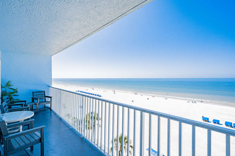 Wake up to endless ocean views from your private balcony, where morning coffee tastes better with white sand stretching below.