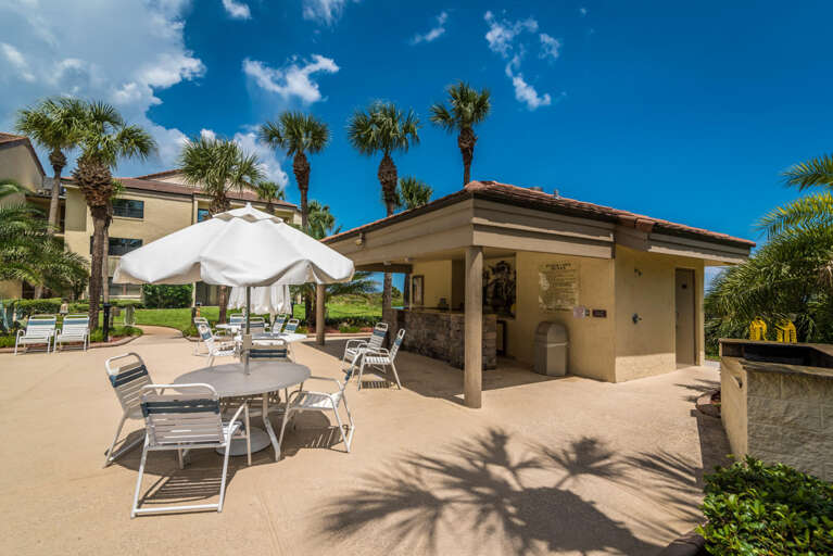 one of two Vista poolside grill areas