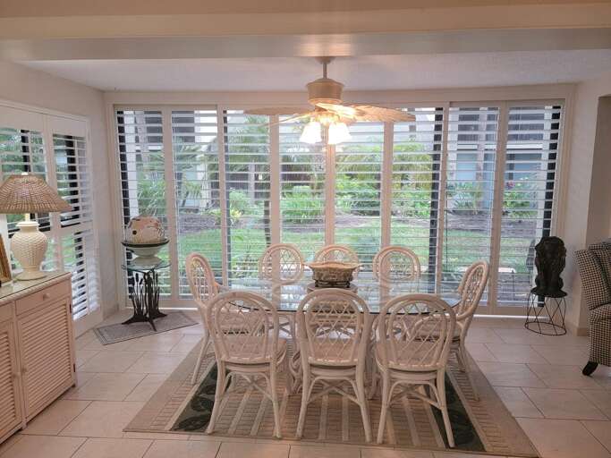Dining area on enclosed lanai