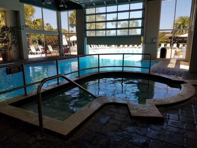 Indoor/outdoor heated pool area   hot tub