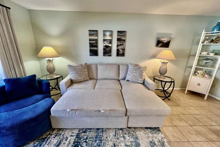 Sofa with pull-out sleeping area