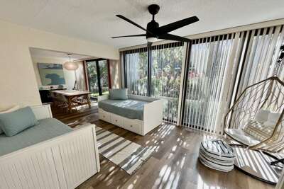 relax on the cozy enclosed lanai