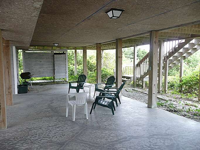 Outside shower and grill area Outside shower and grill area