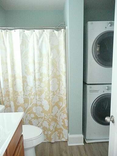 Hall bath with laundry area Hall bath with laundry area