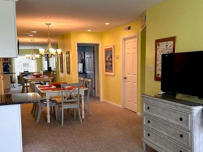 dining area leading to bedrooms 2 and 3  dining area leading to bedrooms 2 and 3