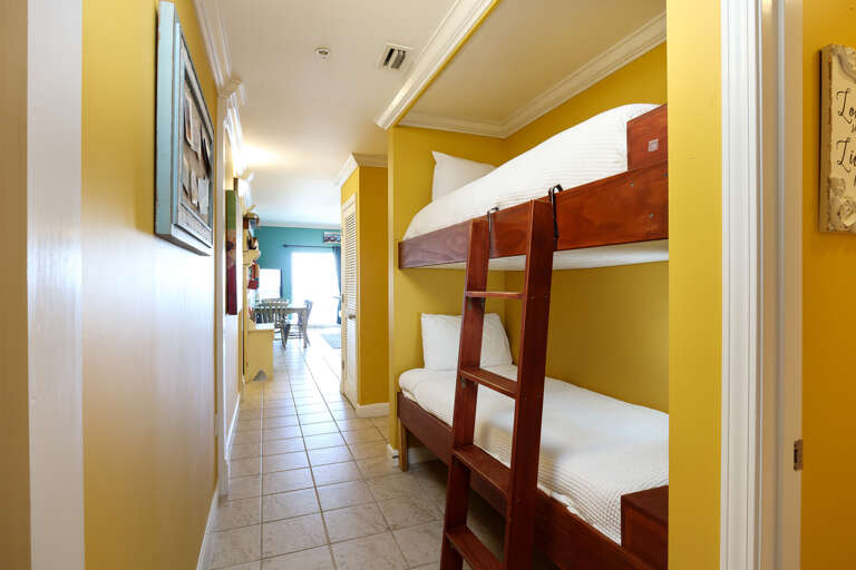 Hallway bunk beds for the little ones. They'll have their own space when you rent this two bedroom condo! Hallway bunk beds for the little ones. They'll have their own space when you rent this two bedroom condo!