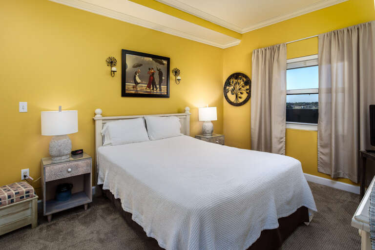 Guest bedroom features a soft comfy queen size bed for two guests. Guest bedroom features a soft comfy queen size bed for two guests.