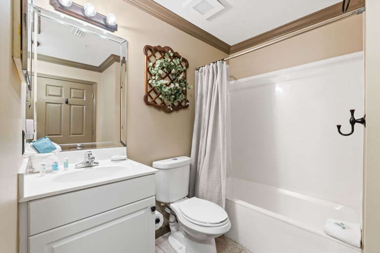 For those occupying the hallway bunks and the guest room. Shower/tub combo.