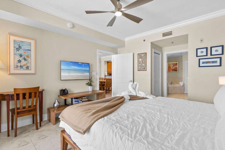 Relax in this serene master bedroom with private bathroom.
