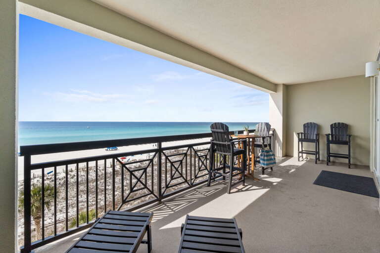 Large balcony with plenty of seating and a dazzling view of the gulf