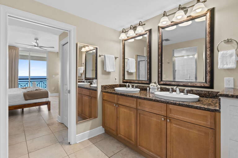 Spacious master bathroom with double sinks and plenty of room to get ready in comfort.