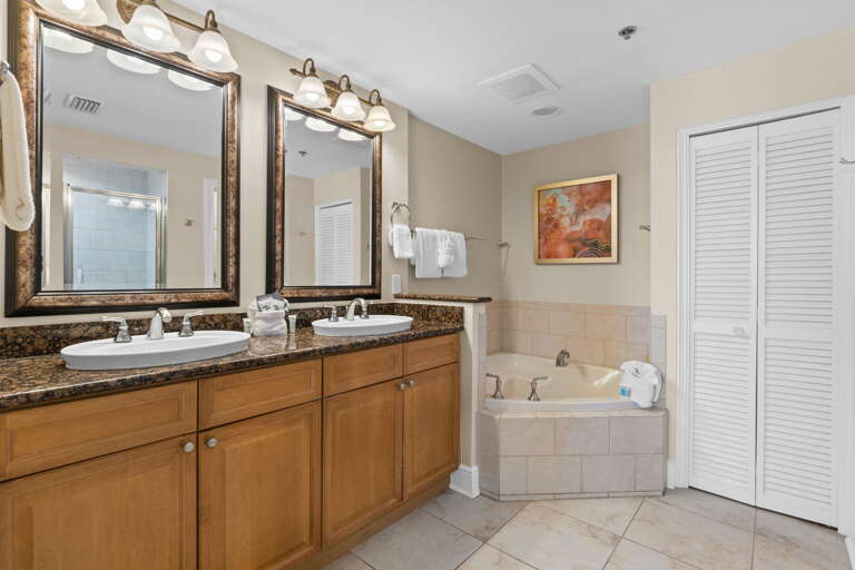 Granite counter tops with deep dish sinks and jacuzzi style tub