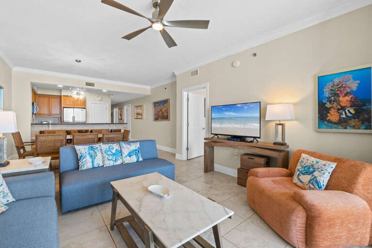 Newly furnished living area designed for comfort and relaxation. Open, airy, and just right for enjoying the coastal lifestyle indoors