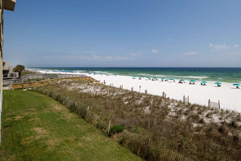 Second floor balcony offers amazing views! You can NOT get any closer to the beach than this!
