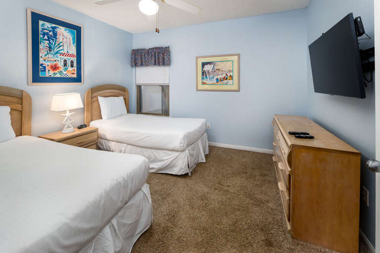 Twin beds and a smart TV