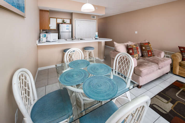The dining area is conveniently located in close proximity to the kitchen.