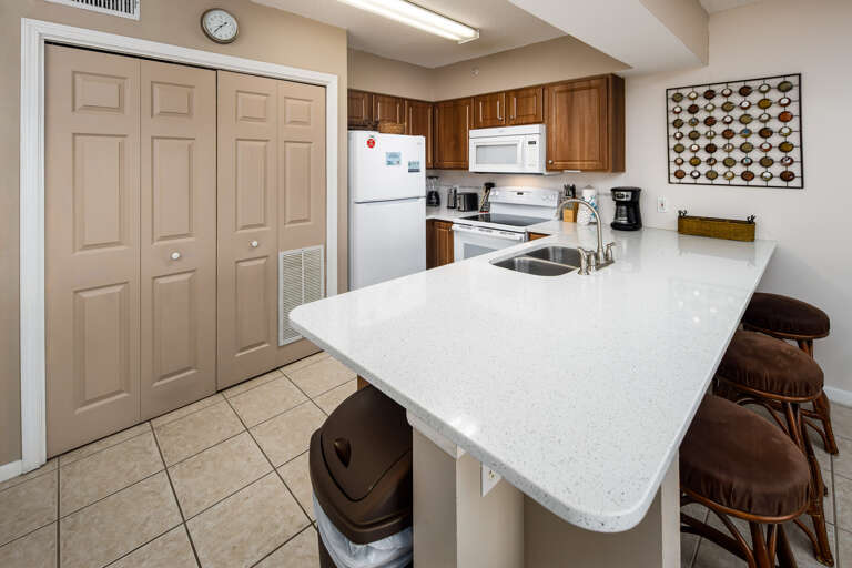 Seating for 3 more guests at the breakfast bar.